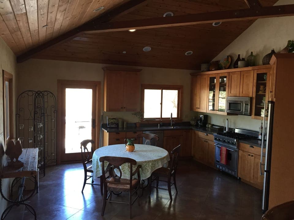 Guest house full kitchen with eating area