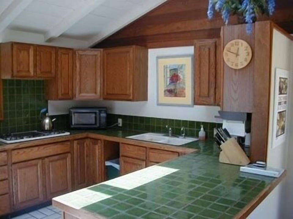Well lit and fully equipped kitchen