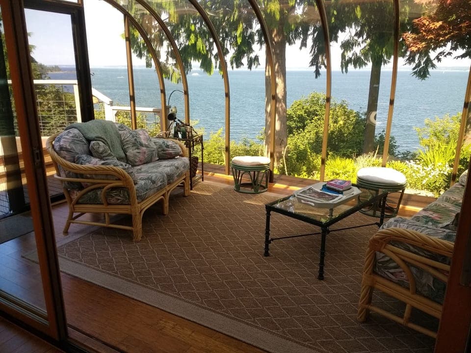Solarium overlooking Pudget Sound and trail to our private beach with kayaks