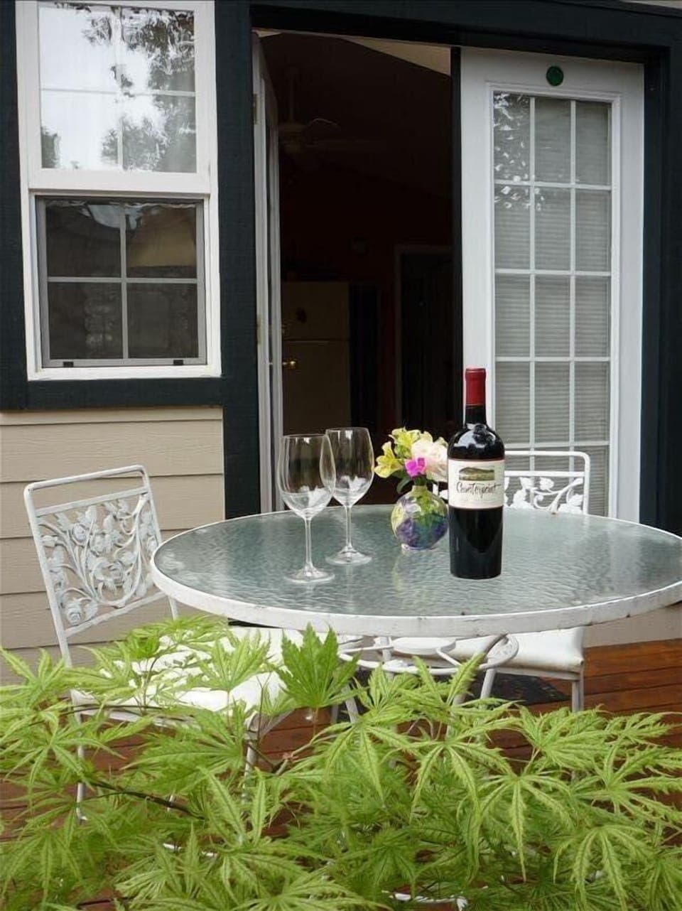 Charming outdoor attached private deck for morning coffee or evening dining.