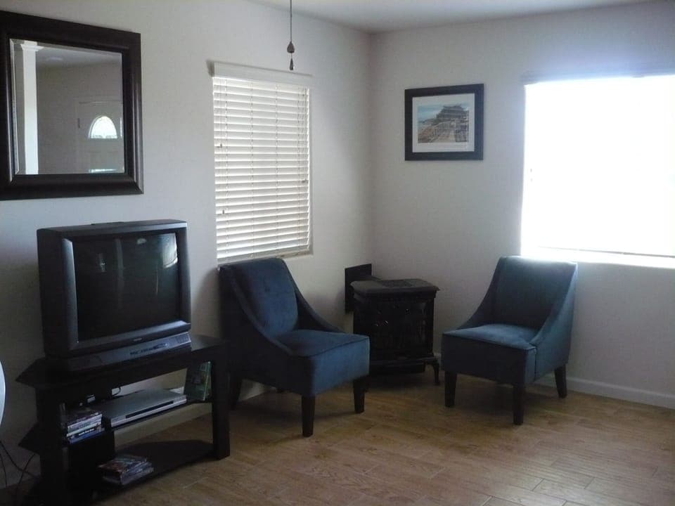 Television including Direct TV,  Blueray player, gas fireplace