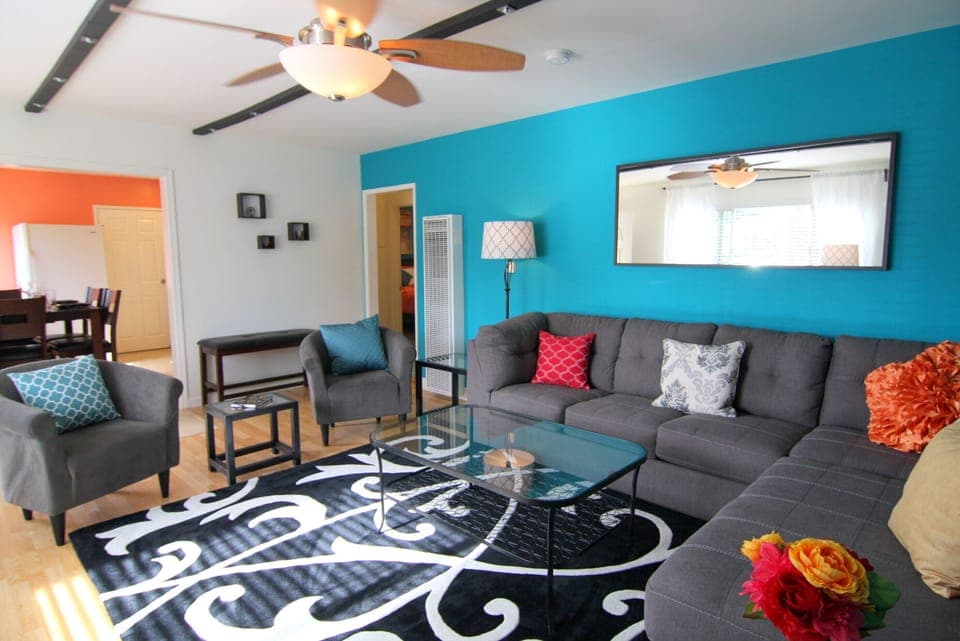 Living area, bright and spacious. Sofa has a sleeper bed.