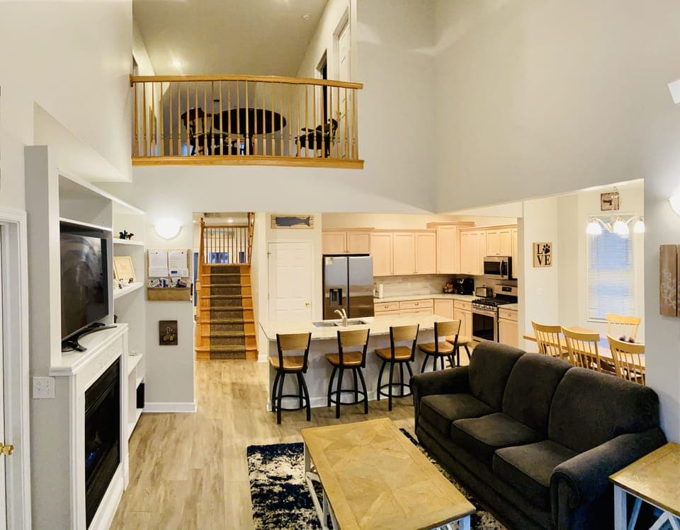 Great room featuring kitchen, family room, and dining room
