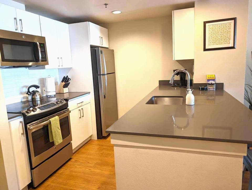 Fully equipped kitchen with stainless appliances