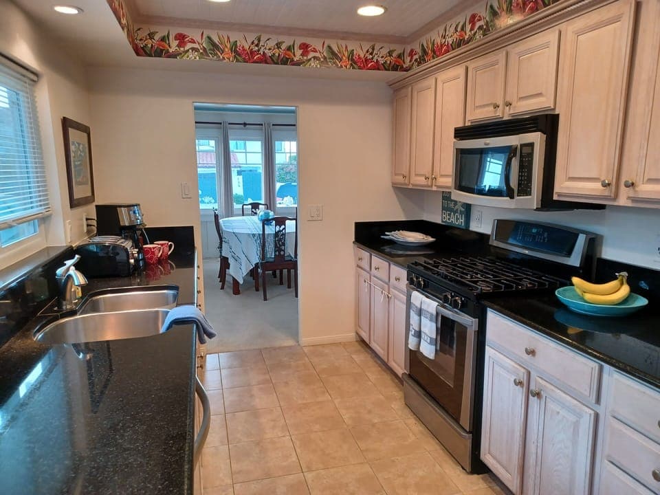 Large kitchen with all amenities included for preparing your meals. Spices, etc.