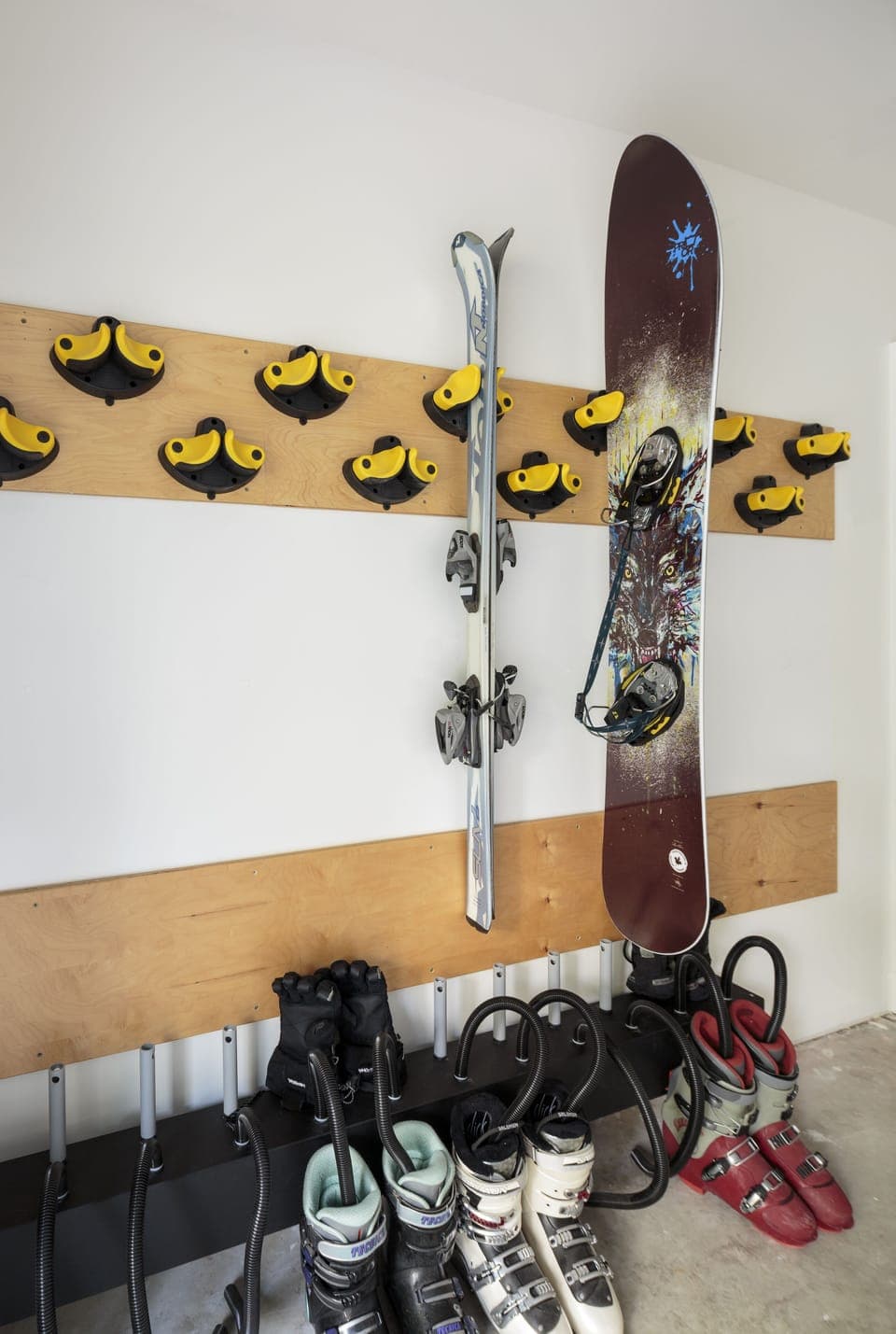 Ski/Snowboard Storage along with  boot and glove dryer in heated Garage.