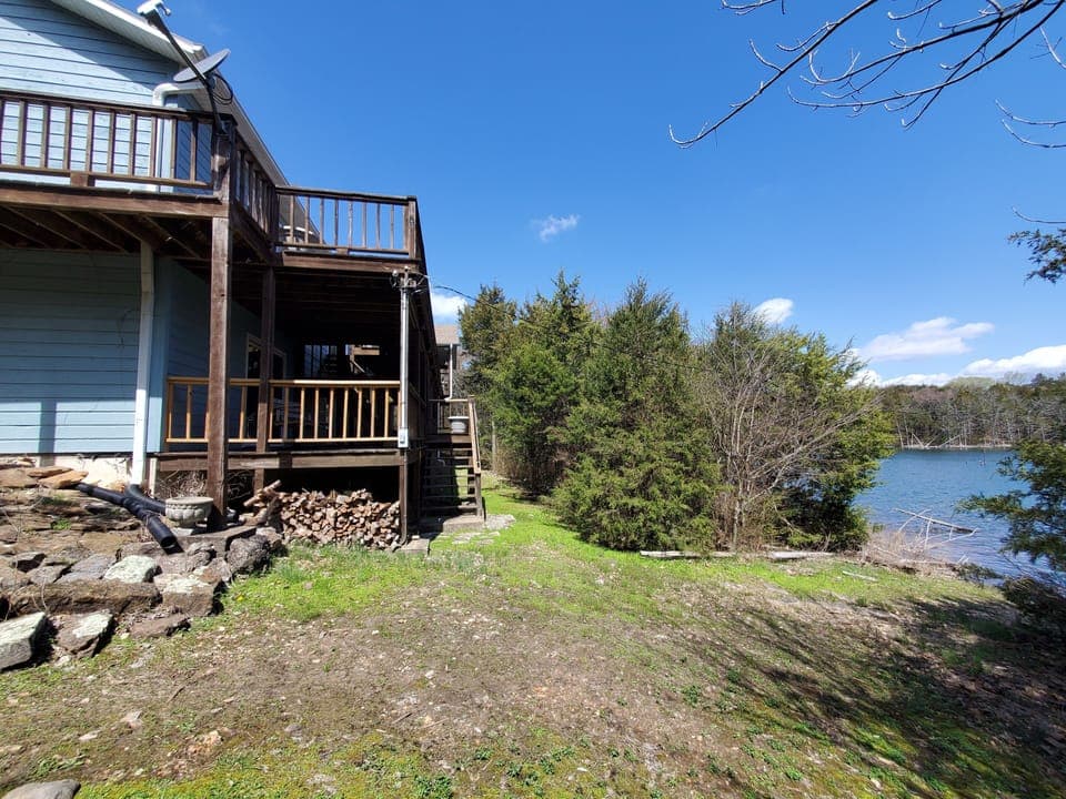 House is very close to the water's edge.