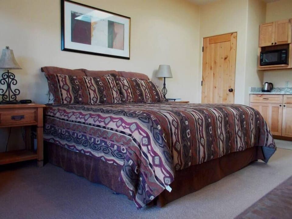 Top-of-the-line king-sized pillow-top bed, plus kitchenette