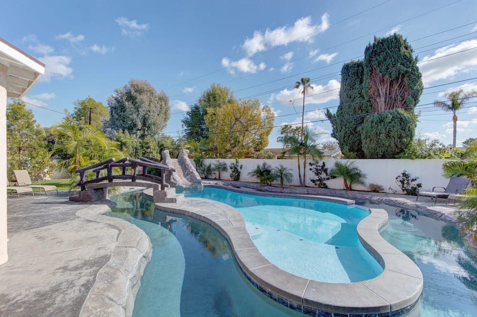 The lazy river flows around the pool and there are waterfalls under the slide! 