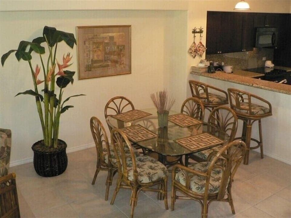 The dining area seats 6 and has a breakfast bar or enjoy morning coffee on the lanai.