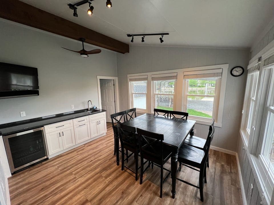 Porch with wet bar, mini fridge and bathroom.  Climate controlled. 