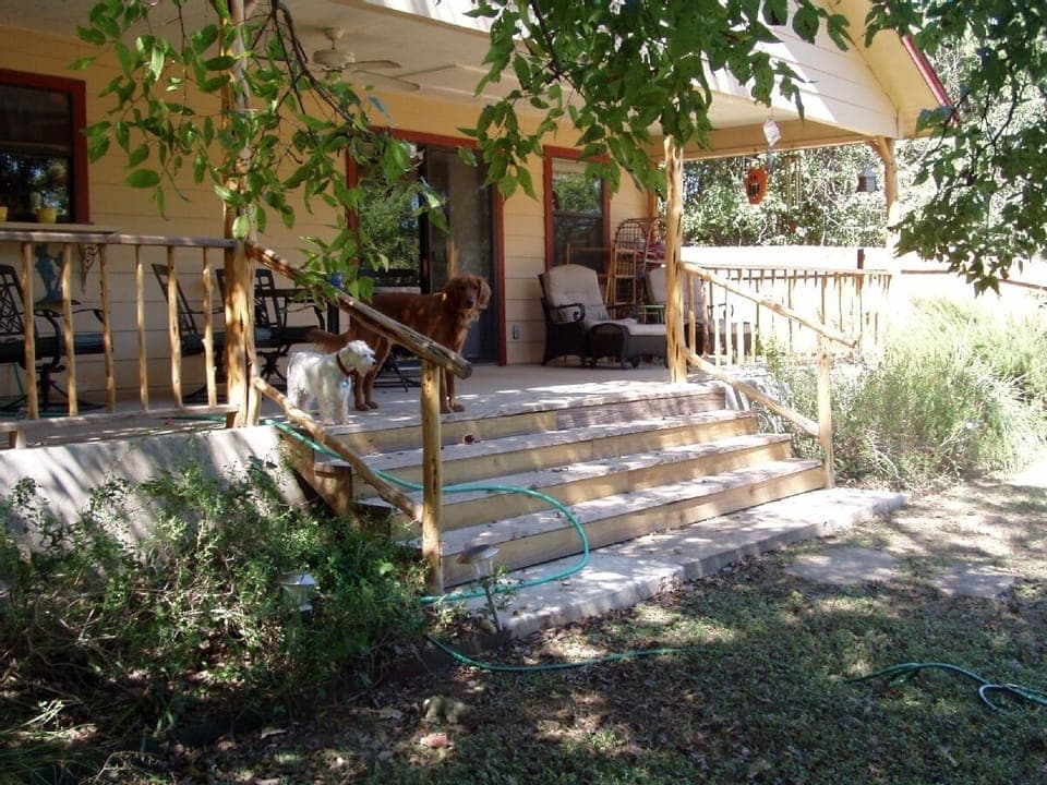 A large and spacious back porch for dining, reading, or just being. 