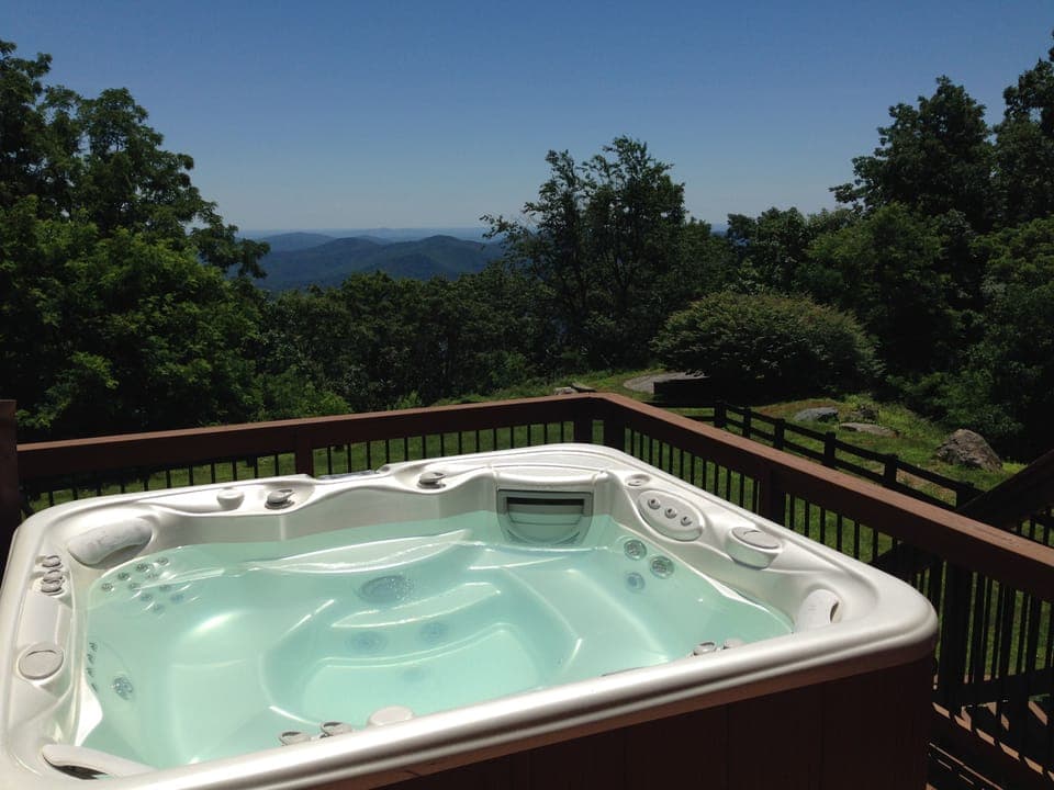 View expansive mountain views and starlit nights from our 7-person hot tub