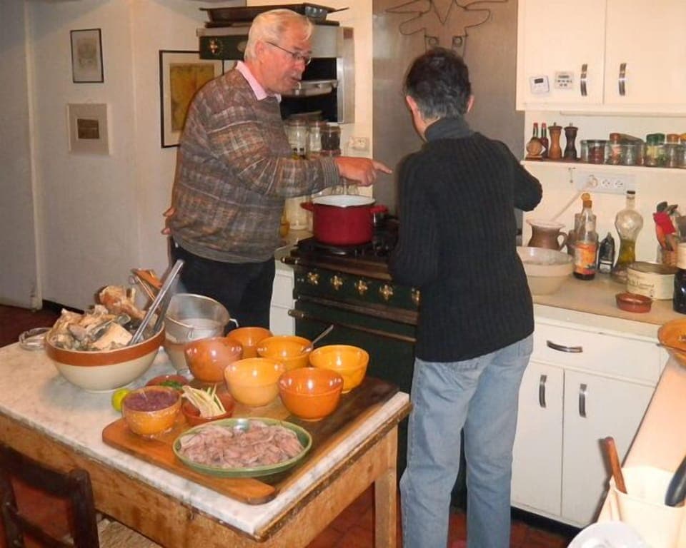 Preparing dinner on professional stove.