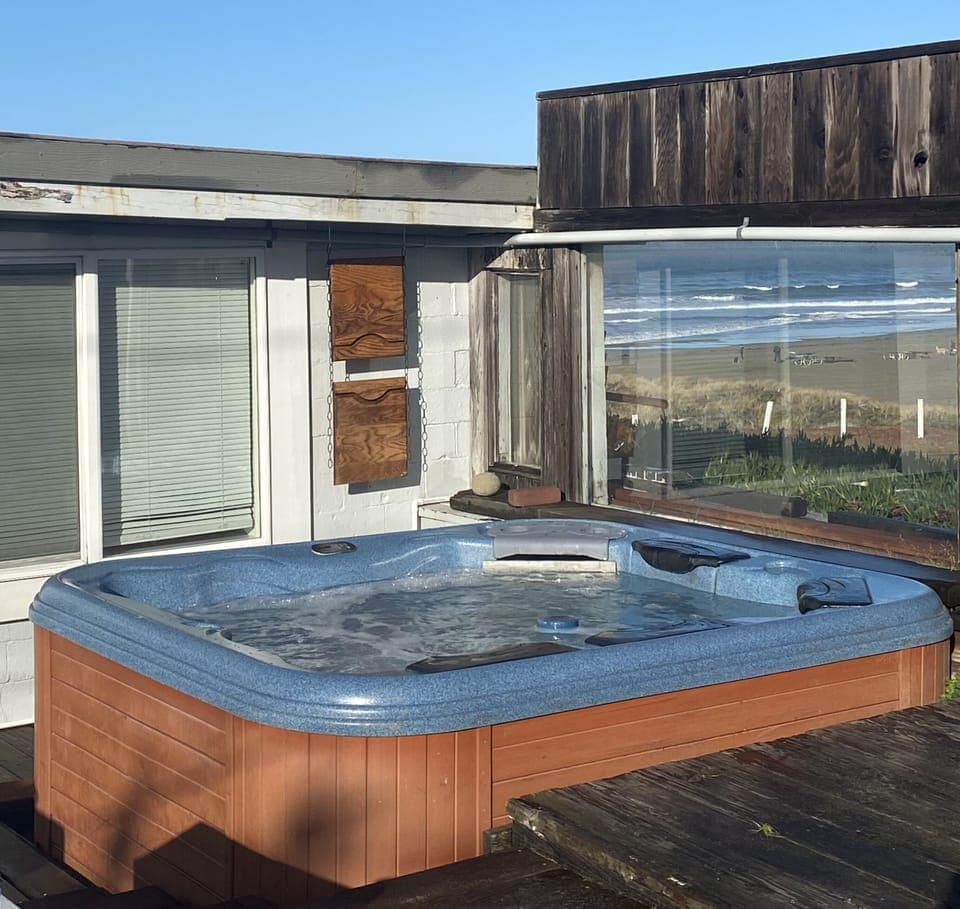Lay In The 4 Person Hot Tub And Watch The Waves Roll In.