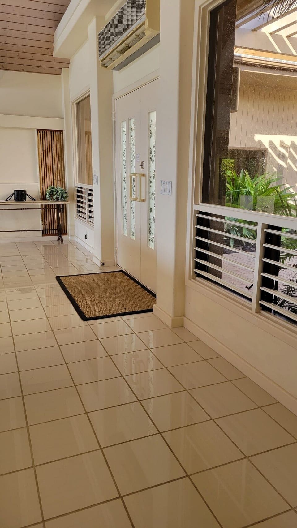 Wooden louvre windows throughout the home provide for great ambient ventilation