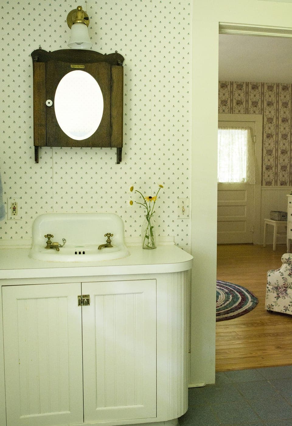 The downstairs bedroom has an adjoining full bathroom with a tub/shower