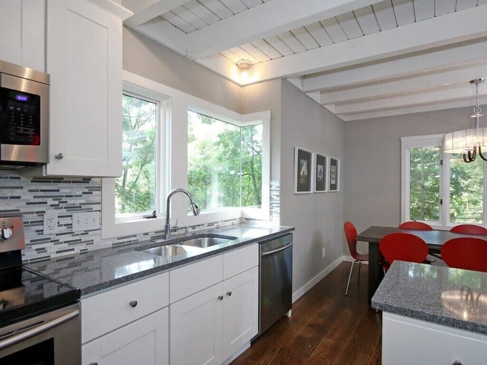 Updated kitchen with stainless appliances. Utility room with washer and dryer.