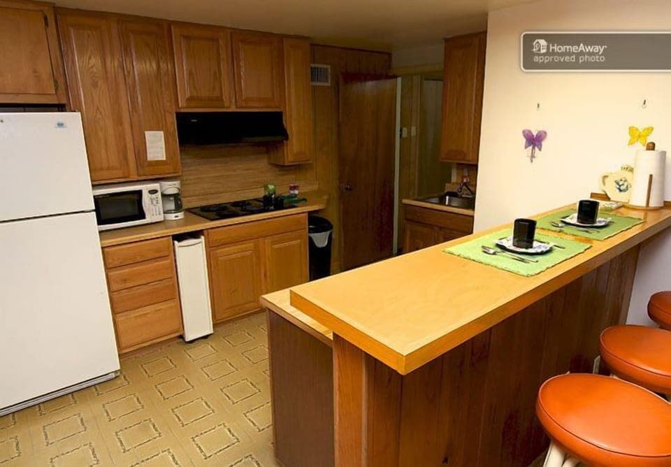 Full kitchen with stove-top.