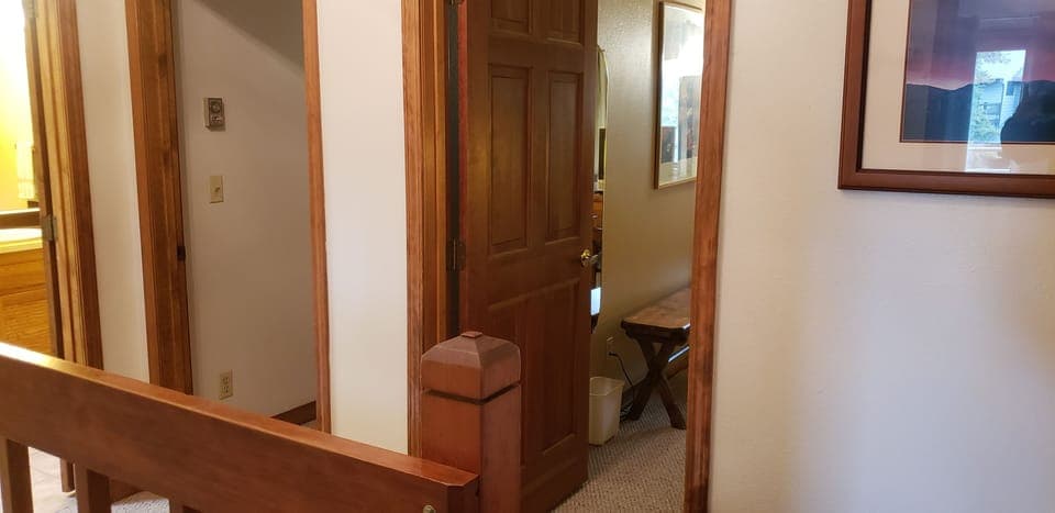 Two bdrms.  Master behind camera. Stairs down lower left