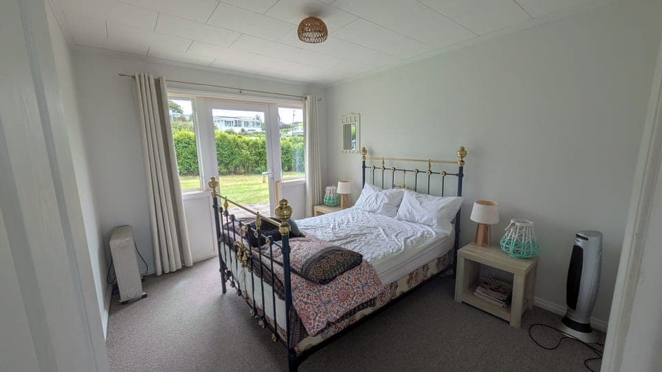 Bedroom 3 - with access to front deck area 
(Double bed)