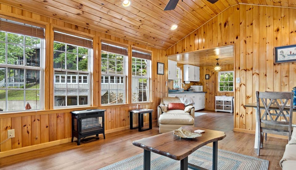 Windows line the wall offering views of Lake Lure