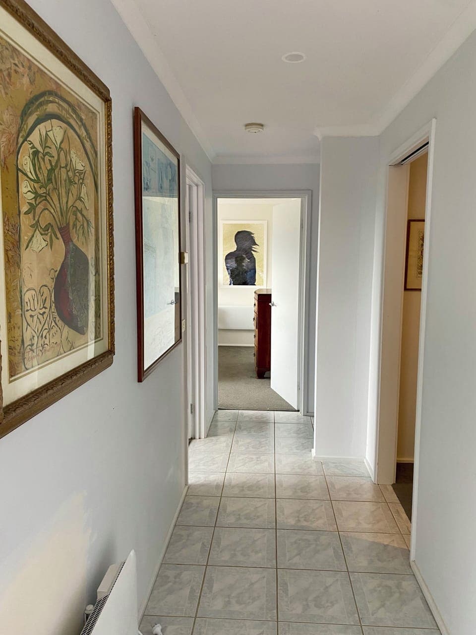 Hallway to the 3 downstairs bedrooms and bathroom.