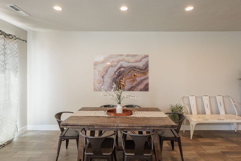 Dining Table - Sit down together and enjoy mealtime at the dining table.  Additional seats are located at the kitchen island.