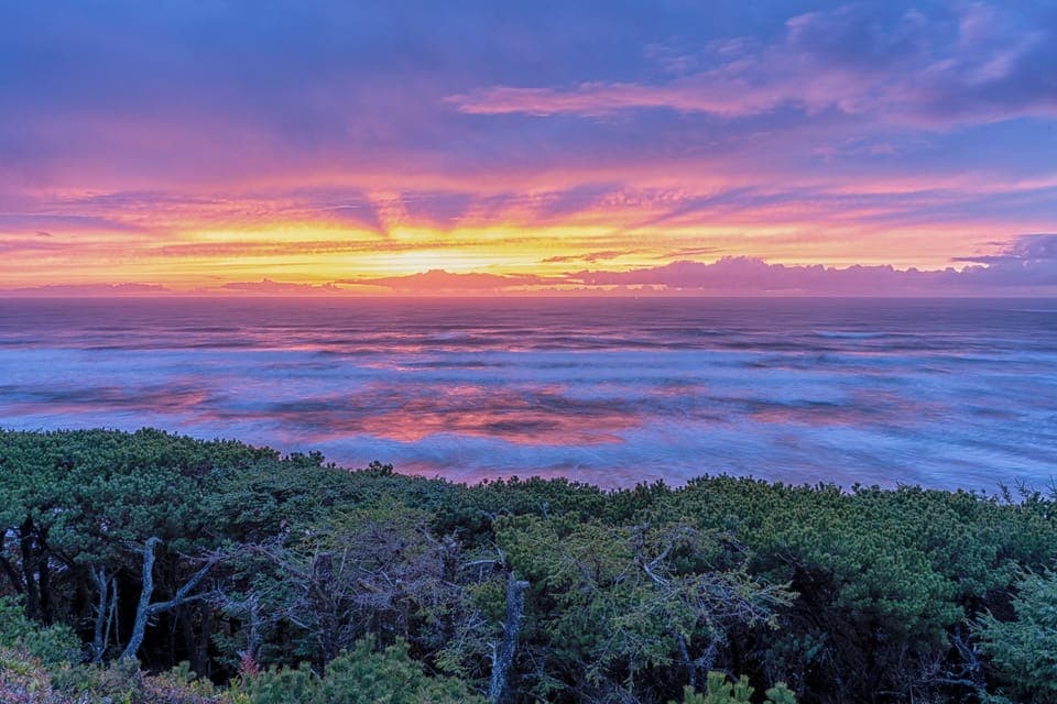 Breathtaking Sunset from master bedrooms, deck, living/dining room, and kitchen
