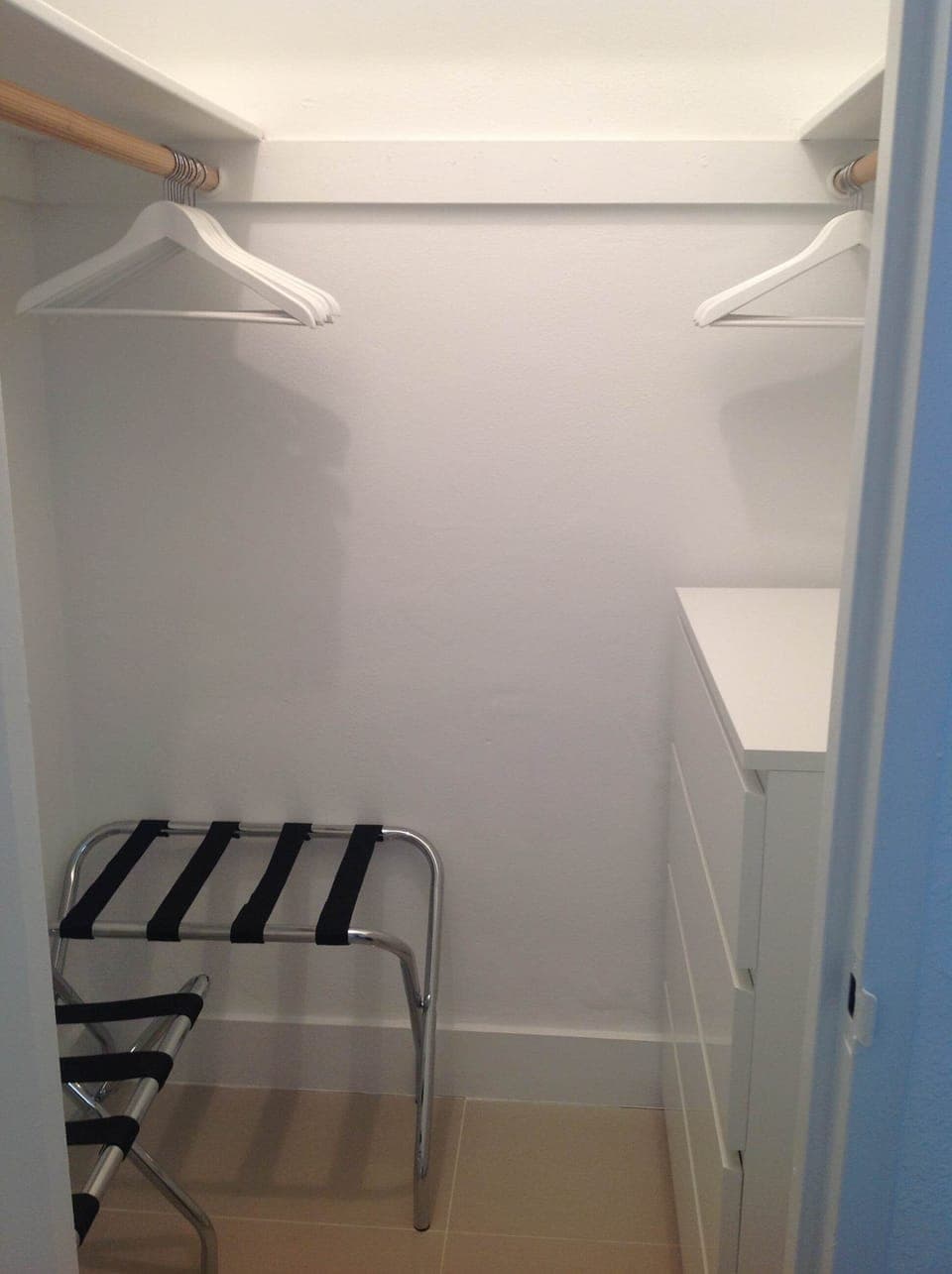 Walking closet with two baggage stands