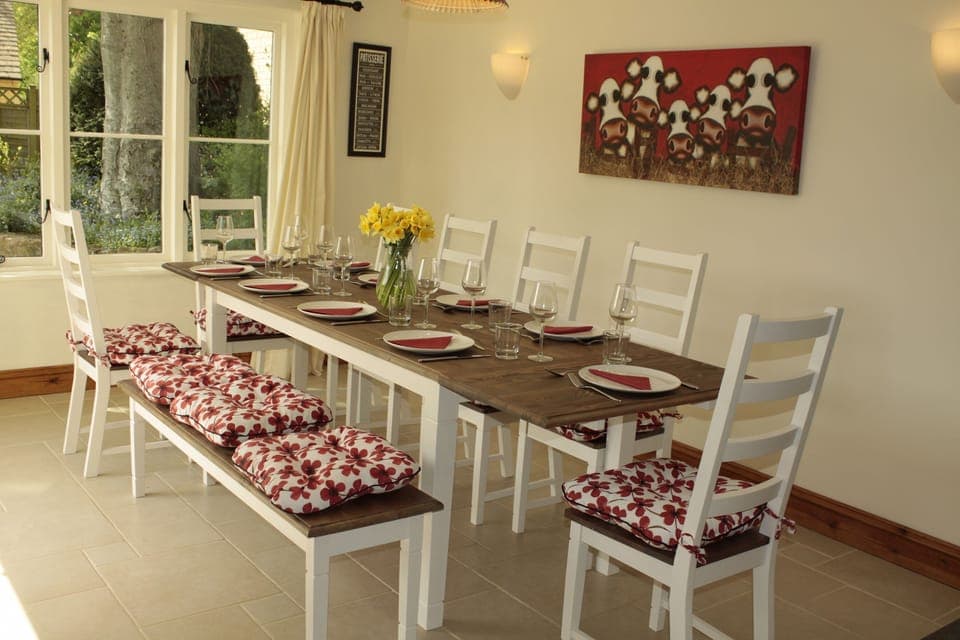 Dining table sits 10 with a breakfast bar for 4