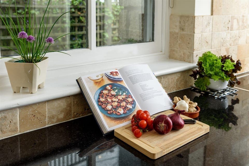 Cook up a feast in the well equipped kitchen.