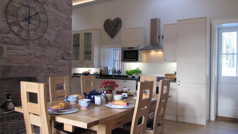 The very Spacious and Light Dining Area with super well-equipped Stylish Kitchen