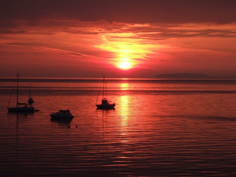Sea view from house, boats at night