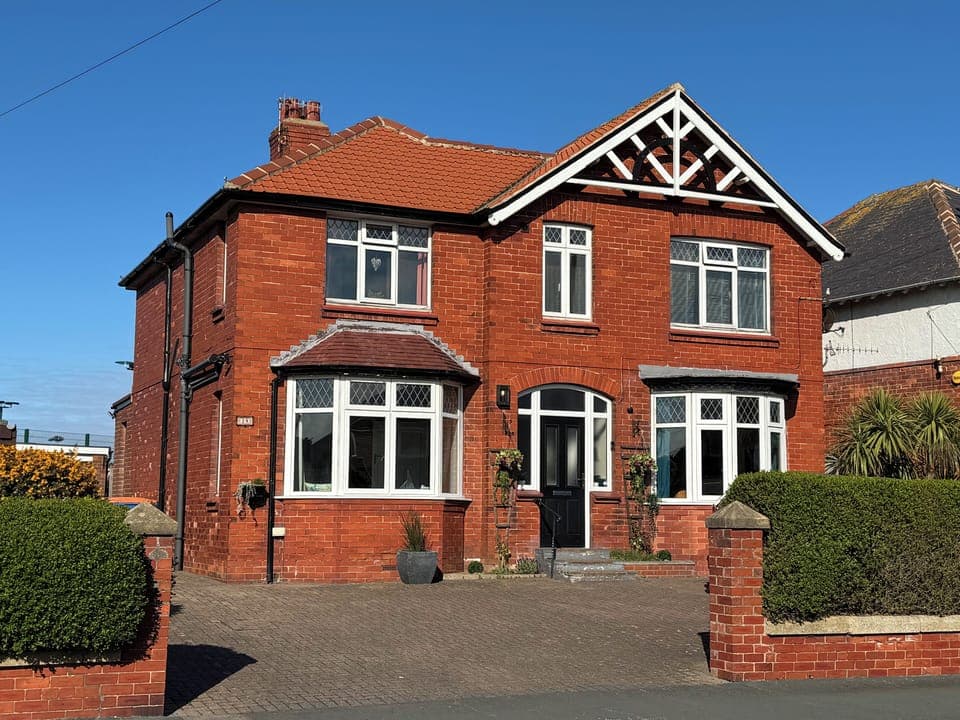 Seamoor House from the road with parking for 4/5 cars on the forecourt.