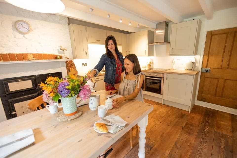 Well equipped, newly fitted kitchen, with utility room beyond. 