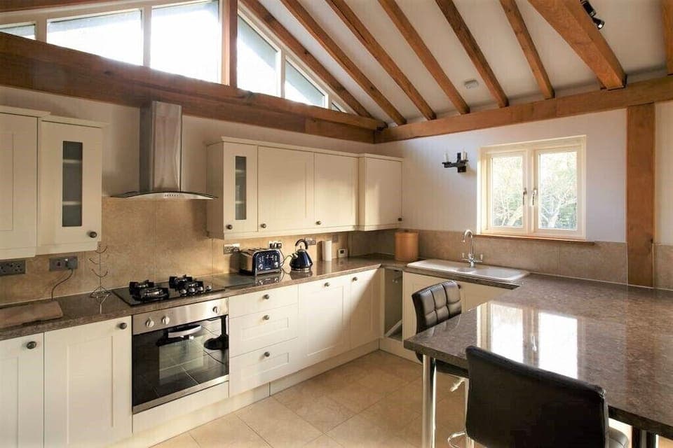 The kitchen with built in oven, washing machine/tumble dryer, fridge, dishwasher