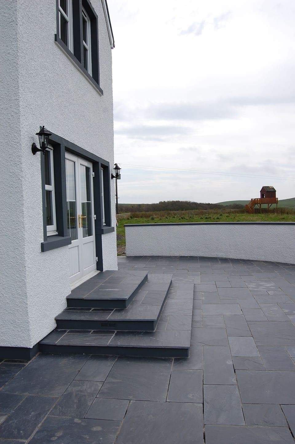 paved patio area at front