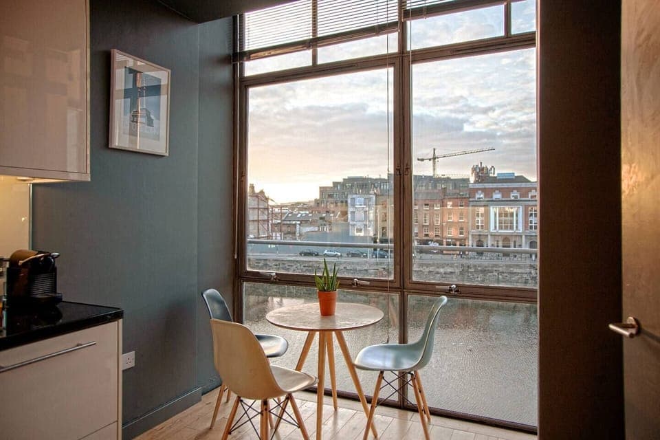Separate kitchen with a wondering floor-to-ceiling window to take in the sunrises and sunsets over Dublin City.