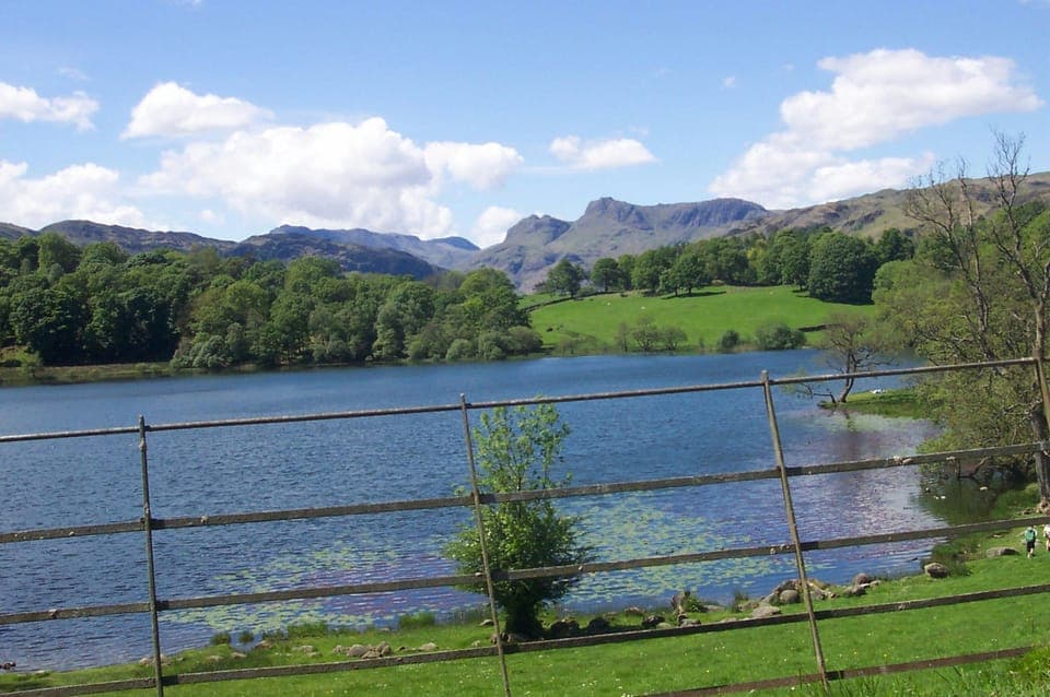 The Langdales from Loughrigg Tarn a pleasant walk