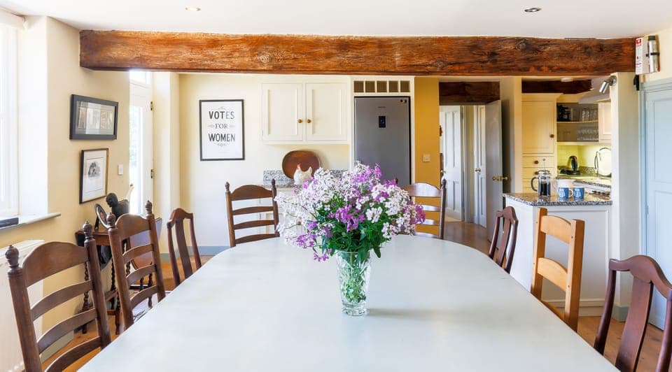 The kitchen table seats 16-18