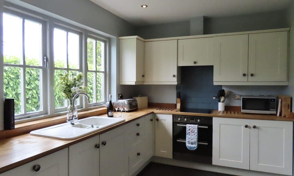 kitchen with a  view over the neighbouring field