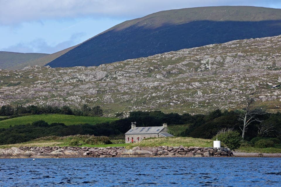 Pier Cottage with mountains behind