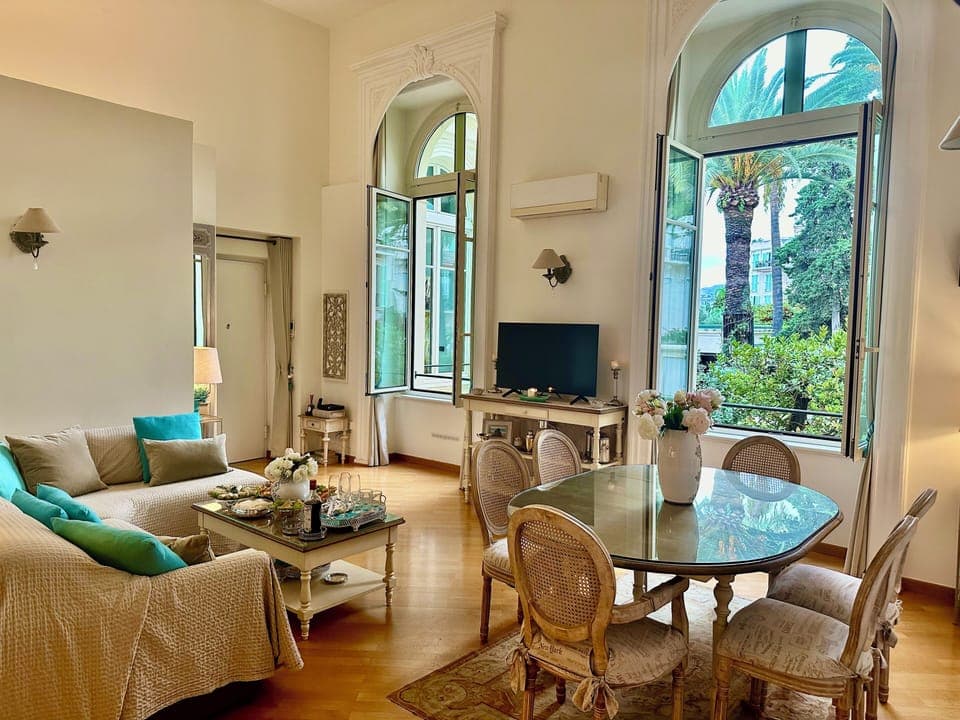 Air-conditioned living/dining room - high ceilings and large period windows 