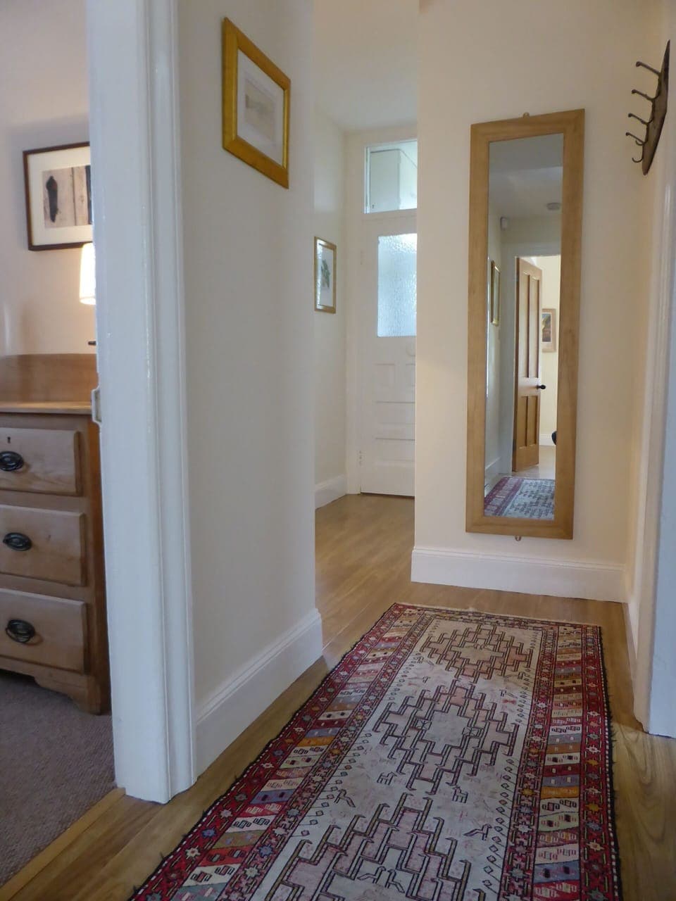 Rugs, artwork and  hand-crafted wooden lamps give Crayfish its distinctive style