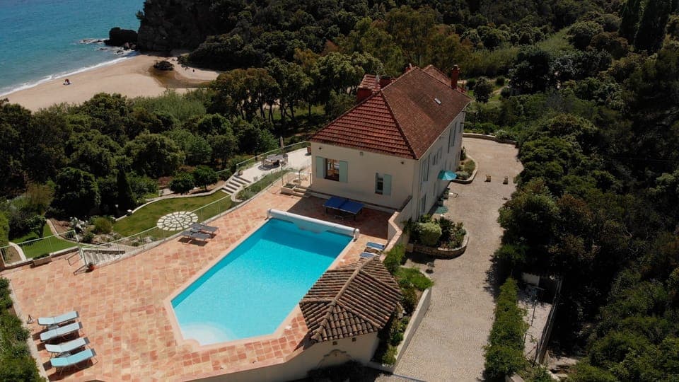 A scene of perfection, sun, sand, pool and terrace