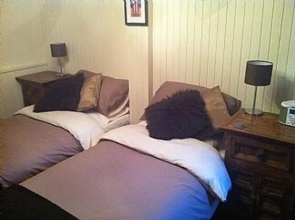 Second bedroom - made up as single beds