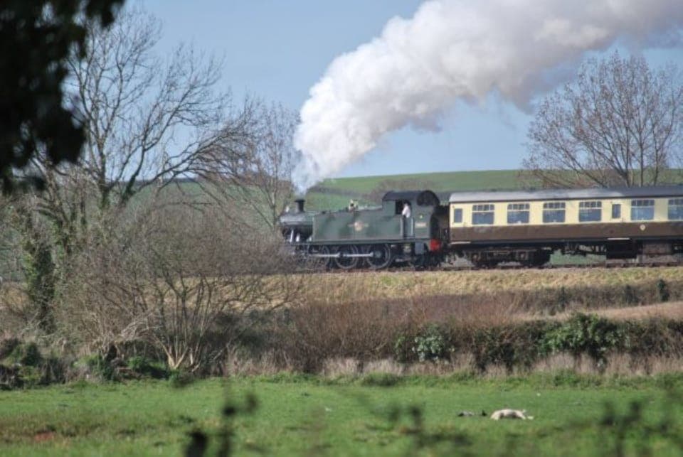Steam train leaving Doniford Halt