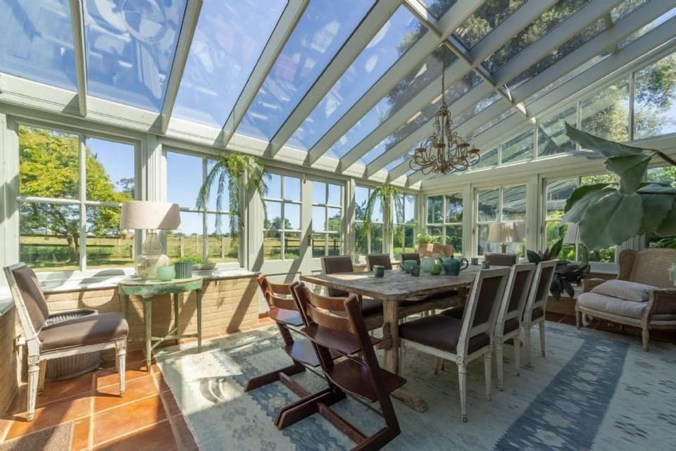 Ground floor: Dining table in the conservatory
