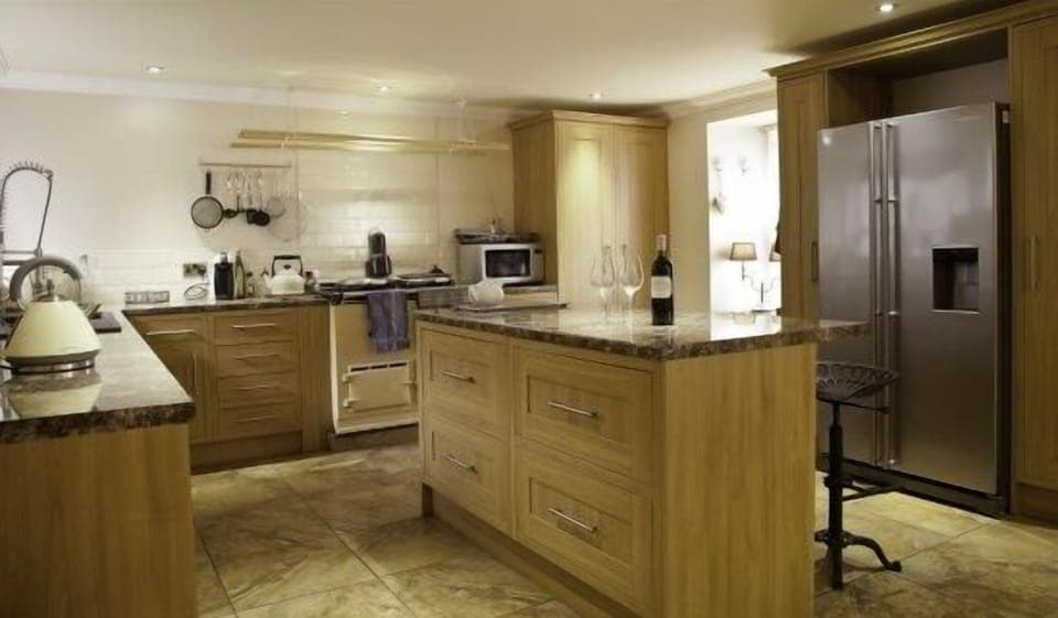Fully fitted kitchen with AGA cooker